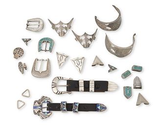 291
Mid/late 20th century
A Group Of Southwest Silver Accessories
Ten works:

A four-piece silver overlay ranger set with turquoise and lapis inlay, mounted to leather strap
Etched to buckle: Jackson [probably]
Buckle: 2" H x 1.75" W; opening: 0.75" H; each keeper: 0.875" H x 0.5" W x 0.75" D; tip: 0.75" H x 0.875" W

A four-piece incised silver ranger set mounted to leather strap
Stamped: RA
Buckle: 1.75" H x 2" W; opening: 1" H; each keeper: 1" H x 0.375" W x 0.5" D; tip: 1" H x 1" W

A four-piece inlaid turquoise ranger set
Appears unmarked
Buckle: 1.125" H x 1.75" W; opening: 0.75" H; each keeper: 0.75" H x 0.5" W x 0.625" D; tip: 0.75" H x 1.125" W

An incised silver buckle and matching tip
Appears unmarked
Buckle: 1.875" H x 2" W; opening: 0.875" H; tip: 0.75" H x 1.25" W

A chased silver buckle
Appears unmarked
1.75" H x 2" W; opening: 0.75" H

A pair of Mexican silver overlay cufflinks
Stamped: Hecho en Mexico / Sterling / 095 / VGV / DF
Each: 1.25" H x 1" W

A four-piece set o