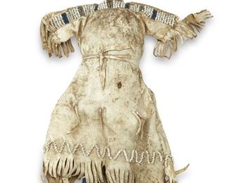 295
Late 19th century; Northern Plains
A Sioux Beaded Hide Doll
Comprising a sinew-sewn padded fabric and hide doll with a fringed hide dress, leggings and facial features with blue, white and metallic beaded accents
9" H x 6" W x 1.75" D
Estimate: $800 - $1,200