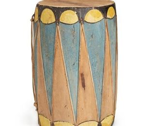 303
Circa 1930s-40s; New Mexico
A Cochiti Pueblo Drum
The blue and yellow painted wood drum with stretched hide and sinew
18.25" H x 12.5" Dia.
Estimate: $300 - $500