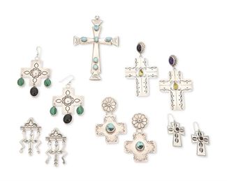 310
Late 20th century
A Group Of Southwest Silver Cross Jewelry
Six works:

A silver and set turquoise cross pendant
Stamped: R [above a crescent] / Sterling
3.5" H x 2.25" W

Lena Platero
(b. 1954, Dine)
A pair of Navajo stamped sterling silver cross earrings with set stone accents
Stamped Lena Platero / Sterling
Each: 2.75" H x 1.5" W

A pair of R Monte stamped silver cross earrings with onyx and malachite set dangles
Stamped: R. Monte / Sterling
Each: 2.75" H x 1.375" W

A pair of Jefferson stamped sterling silver cross earrings with set turquoise
Stamped: Jefferson [script] / Sterling
Each: 2.25" H x 1.375" W

A pair of D. Lucas small silver cross earrings with central set stone
Stamped: D. Lucas / Sterling
Each: 1.75" H x 0.75" W

A pair of stamped silver pierced earrings with cross and lighting bolt dangles
Appear unmarked
Each: 1.75" H

11 pieces
94.2 grams gross
Estimate: $200 - $400