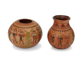 322
Ken And Irene White (B. 20th Century, Dine)
Two works:

A polychrome vase, late 20th century
Signed to underside: KW / Navajo
The pinched-neck vase with an incised band of polychrome Yei figures and finished with a pine pitch gloss
5.75" H x 4.75" Dia.

A polychrome vase, late 20th century
Signed to underside: KW
The round vase with an incised band of polychrome Yei figures and finished with a pine pitch gloss
4.75" H x 6" Dia.

2 pieces
Estimate: $75 - $125