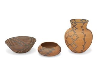 329
David Salk (B. 20th Century)
Three works:

A Washo-style clay basket
Signed to underside: D. Salk
The stoneware vessel in the form of a Washo basketry low bowl with baked iron designs
3" H x 7.25" Dia.

A Pima-style clay basket, 1987
Signed and dated to underside: D. Salk / 87
The stoneware vessel in the form of a Pima basketry bowl with baked iron designs
3.75" H x 10" Dia.

An Apache-style clay basket, 1988
Signed and dated to underside: D. Salk / 1988
The stoneware vessel in the form of an Apache basketry vessel with baked iron designs
10.25" H x 8" Dia.

3 pieces
Estimate: $200 - $400