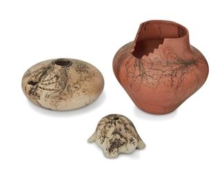 330
Three Southwestern Horse Hair Pottery Vessels
Three works:

Ray and Laveitha Sanchez (b. 20th century, Dine)
A redware horse hair jar
Signed to underside: Ray & / Laveitha / Sanchez / Navajo
With stepped opening to rim and wide shoulder
7.5" H x 7.5" Dia.

Two white horse hair pots
20th century
Bowl singed: N / Plum Yahtahey; turtle signed: [N or W] / Plum
Comprising a bowl and a turtle vessel, each with cut designs, 2 pieces
Bowl: 3.5" H x 7.25" Dia.; turtle: 3" H x 4.25" W x 6.25" D

3 pieces
Estimate: $100 - $200