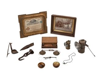 334
Early/mid-20th century
A Group Of Mining Items
Comprising an early field scale with horn bowls (bowl: 2.75" Dia.), a brass prospector's scale with oak box and a variety of brass weights (box: 1.125" H x 7.5" W x 3.375" D), a wrought iron ax head, a wrought iron smelter's cup, a wrought iron hook, a small miner's lamp (4" H), and a larger miner's lamp (6.5" H), together with a period framed photograph of a group of miners (frame: 10.75" H x 12.75" W) and a Glen Placer Mining Company Stock Certificate framed in an elaborate period gilt frame (issued in 1899, 8 of 2000 shares, Denver, CO; frame: 13" H x 15" W), 10 pieces
Estimate: $200 - $300
