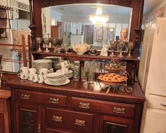 Mahogany buffet And christmas dishes