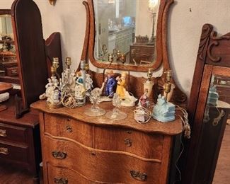 Serpentine oak dresser with mirror. Vintage Figural lamps