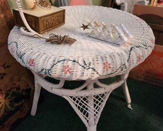 Is painted wicker table