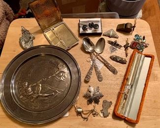 Lots of interesting sterling and other just fun pieces.
Sterling Creation of Adam plate is sold.
Sterling cigarette case
Sterling Stieff spoons
Sterling brooches
