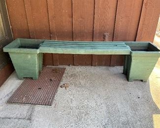 Green plastic bench with planters.  68.5x17x14.5