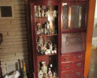 Mahogany side by side with lots of figurines from the LaFollette House $950.00