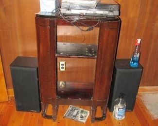 Old radio converted to bookcase and turntable w/speakers