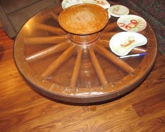 Wagon wheel coffee table & hand painted china by Reba Smith of LaFollette