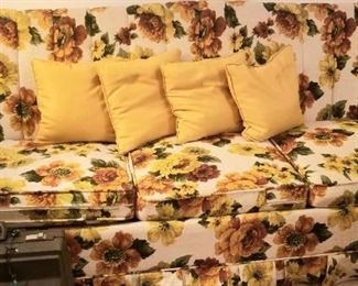 This couch would be cute in a sunroom, the yellow really pops