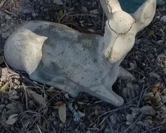 this concrete baby is injured but still needs a home