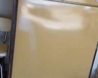 Garage fridge, not a beauty but will keep your beer cold