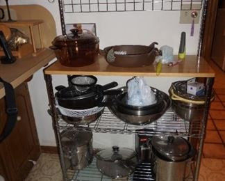 bakers rack with kitchen items