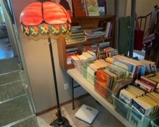 vintage Tiffany style lamp and books