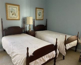 (F1) $250 each. Matching Twin bed frames. Solid Wood - excellent condition.  (Mattresses are older but included if you want them.) Headboards are 55" tall x 40" wide. 