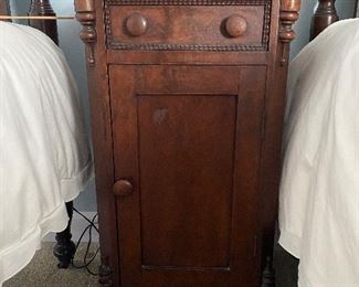 (F3) $95. Antique bedside table. Very good condition. Measures 16" deep x 14" wide x 30" tall. 