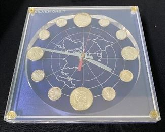 $50. 1964 Numismatic Silver Orbit Clock 