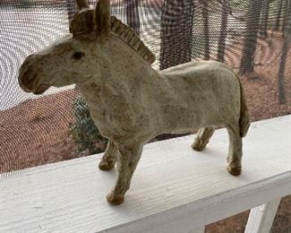 $30. Unsigned Pottery Horse - has had leg repair. 