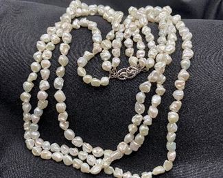 $60. Sterling Clasp with 3 strands of freshwater pearls 