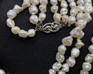$60. Sterling Clasp with 3 strands of freshwater pearls 