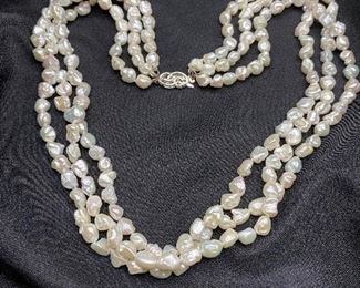 $60. Sterling Clasp with 3 strands of freshwater pearls 