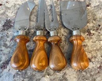 $12. Berti set of 4 cheese server. 