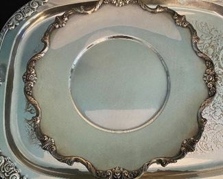 $8 round silver plate Tray. 