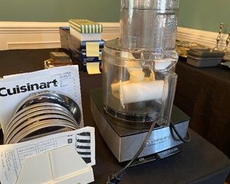$50 Cuisinart Food Processor with extra blades. 