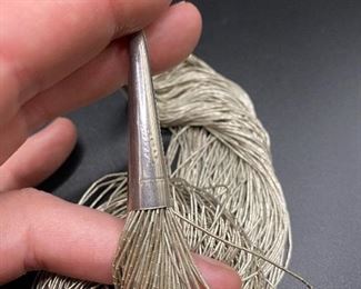 $75. Sterling Necklace "Liquid Silver" 100 strands. 69.3 grams 