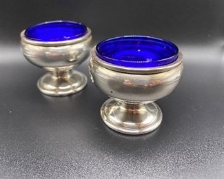 $250. Sterling Silver Salt Cellars and Pepper Shakers. <M> Mueck -Carey Hallmark. 