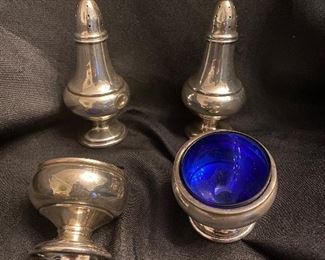 $250. Sterling Silver Salt Cellars and Pepper Shakers. <M> Mueck -Carey Hallmark. 