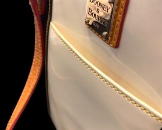 $60. Dooney & Burke Black Tote Bag. Has been used - the inside has some marks. 