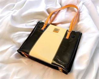 $60. Dooney & Burke Black Tote Bag. Has been used - the inside has some marks. 