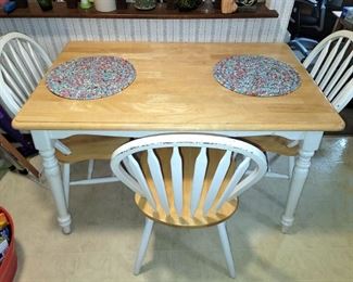Kitchen table with three chairs. Text Gail at 630-432-0926 for prices and to purchase now