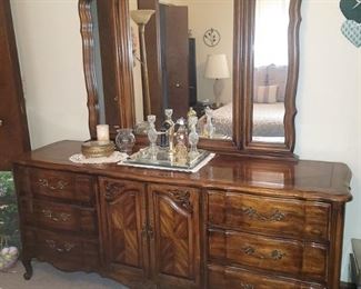 Dresser with triple mirror with matching queen bed, two nightstands and gentlemen's chest. gentlemans chest. Text Gail at 630-432-0926 for prices and to purchase now