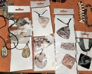 Hundreds of beautiful natural stone pendants