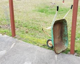 Wheelbarrow still operates or use as yard art/planter