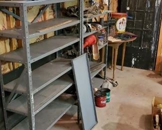 4 - 3'x5'x12" steel shelving units. 2 with 6 shelves, 2 with 4 shelves
