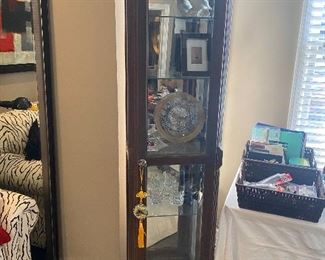 Lot #23 - $175 Lighted display cabinet . 20" x 12" x 71-1/2"H