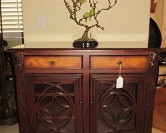 Beautiful wine cabinet      Cast sculpture birds on vine