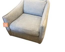 $870 USD       Bernhardt Jolie 360 Swivel Chair in Grey Flannel TH154-14      Description:  Relaxation meets sophisticated European styling. The Jolie offers a lot of look, with her flange edged arm and low, deep seat, this chair is the ultimate in comfort and comes standard with a superior plush cushion. Featured in a warm greige body cloth and accented with a pair of linen flange pillows and a second pair in a neutral, transitional damask pattern. Swivel chair. Low European-style seating. Exposed wood legs.
Condition: New - Interior Design Studio Floor Sample
Dimensions: W 36" / D 38" / H 32.5" / 95 lb.
Local pick up Lake Oswego, OR.  Showroom with main floor access. Contact us for shipper suggestions.      https://goodbyhello.com/products/copy-of-norwalk-hexagon-ottoman-thd-13?_pos=5&_sid=f9cbd366d&_ss=r