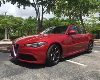Alfa Romeo Giulia TI RWD

Year: 2017
Miles: 52,000
Color: custom Rosso Etna and red leather sports seats
Price: $23,800