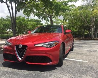 Alfa Romeo Giulia TI RWD

Year: 2017
Miles: 52,000
Color: custom Rosso Etna and red leather sports seats
Price: $23,800