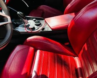 Alfa Romeo Giulia TI RWD

Year: 2017
Miles: 52,000
Color: custom Rosso Etna and red leather sports seats
Price: $23,800