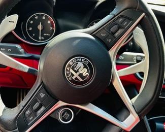 Alfa Romeo Giulia TI RWD

Year: 2017
Miles: 52,000
Color: custom Rosso Etna and red leather sports seats
Price: $23,800