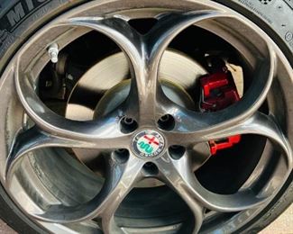 Alfa Romeo Giulia TI RWD

Year: 2017
Miles: 52,000
Color: custom Rosso Etna and red leather sports seats
Price: $23,800