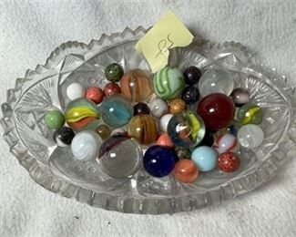 Lot 58 11 Bid(s)
German Made Marbles Various Colors and Sizes with a Marco Jerman Marble w/shell